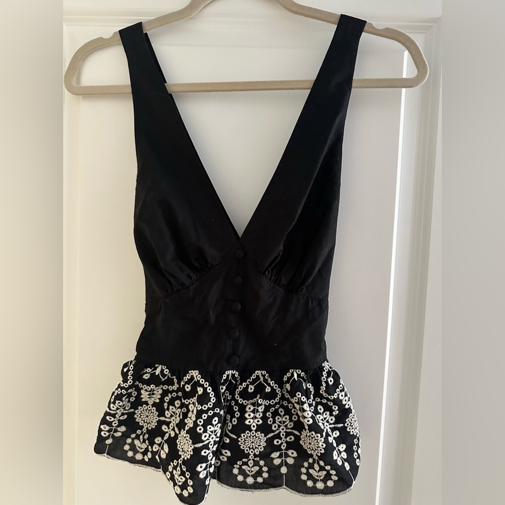 Elegant Black and White Embroidered Peplum top